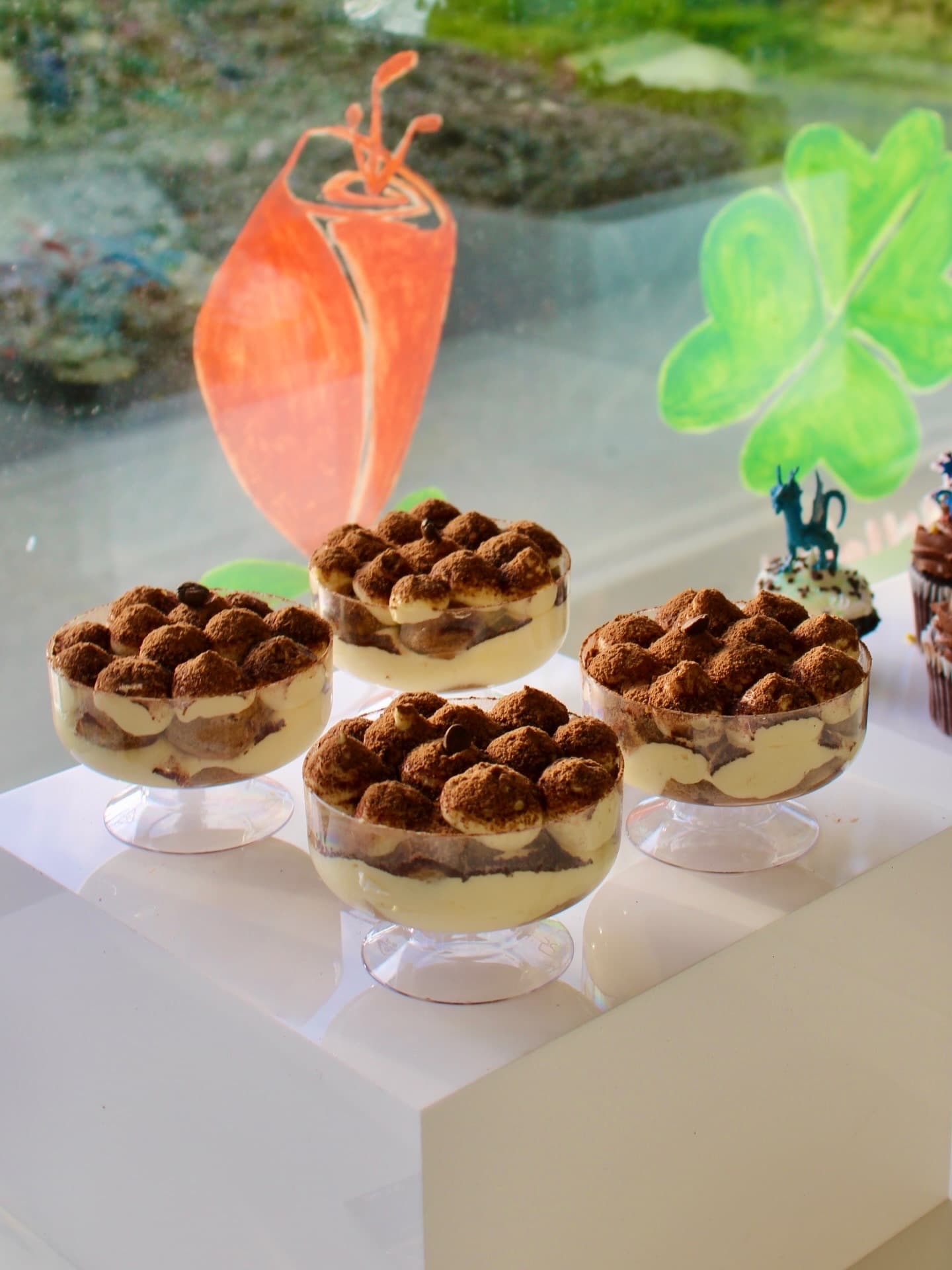 Individual house-made tiramisu cups displayed for a Forno Via catered celebration