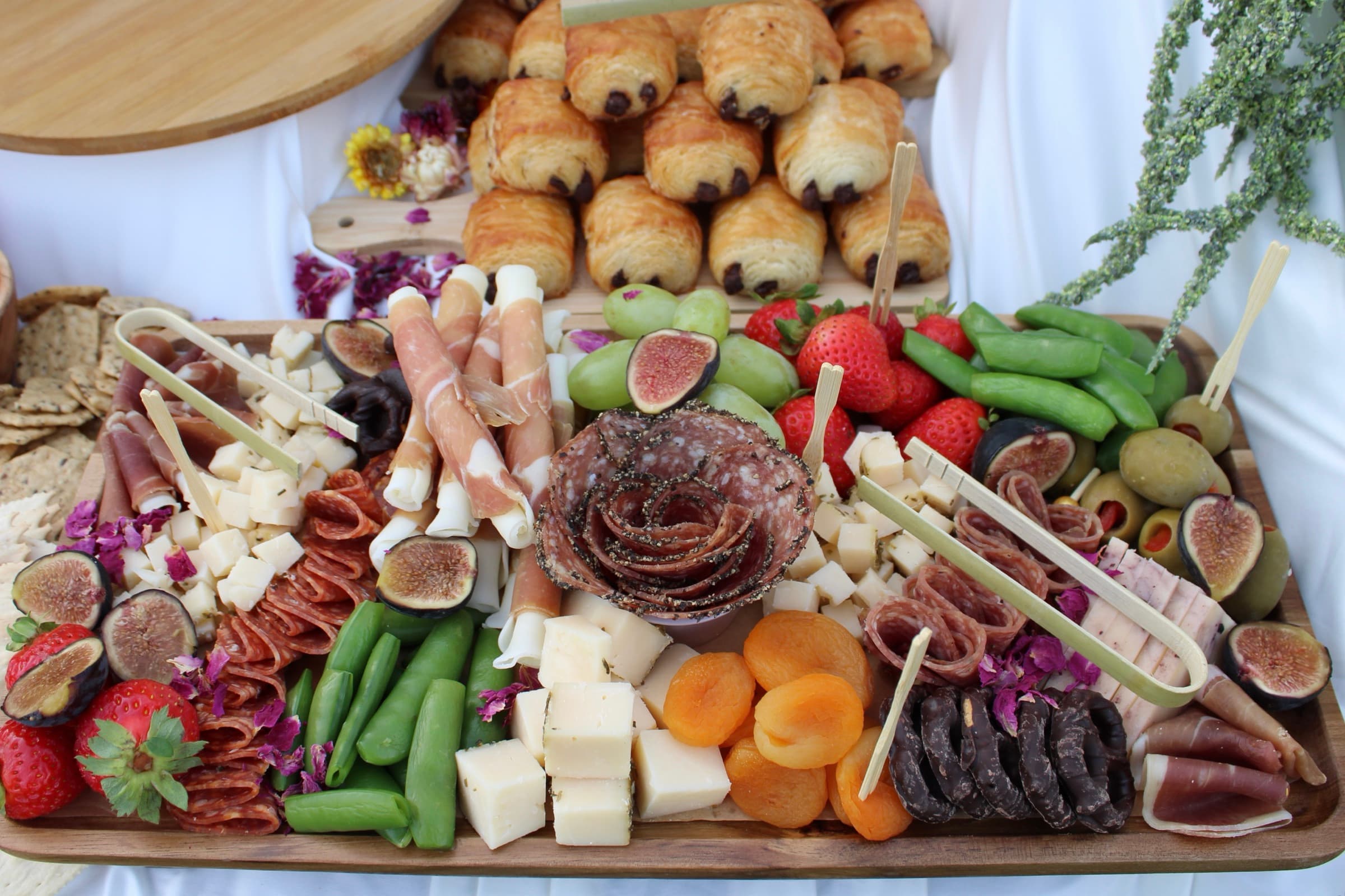 Forno Via grazing table with cured meats, cheeses, fruit, vegetables, breads, and accompaniments